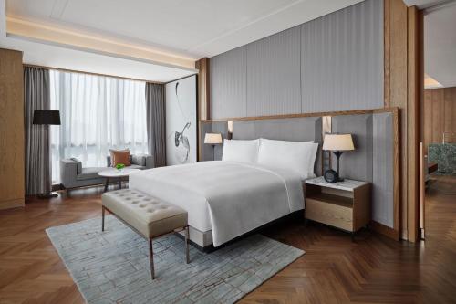 Imagen de la habitación del Hotel JW Marriott Taiyuan. Foto 19