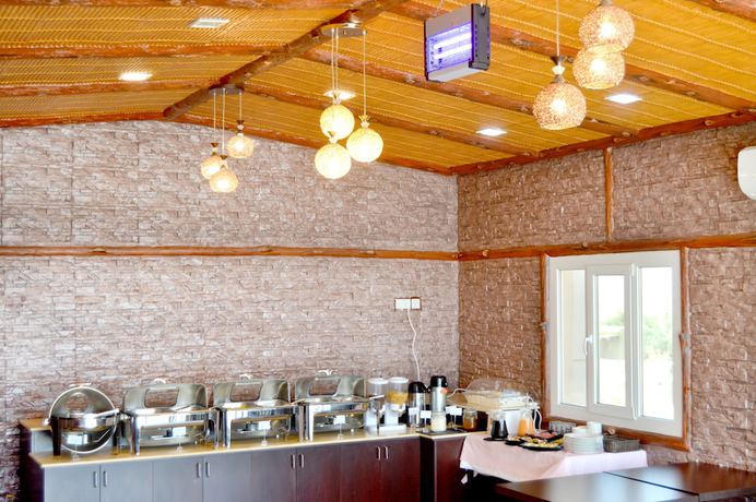 Imagen del bar/restaurante del Hotel Jabal Al Akhdar Grand Hotel. Foto 5