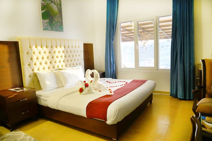Imagen de la habitación del Hotel Jabal Al Akhdar Grand Hotel. Foto 13