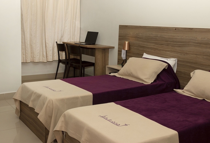 Imagen de la habitación del Hotel Jabuticaba Business. Foto 6