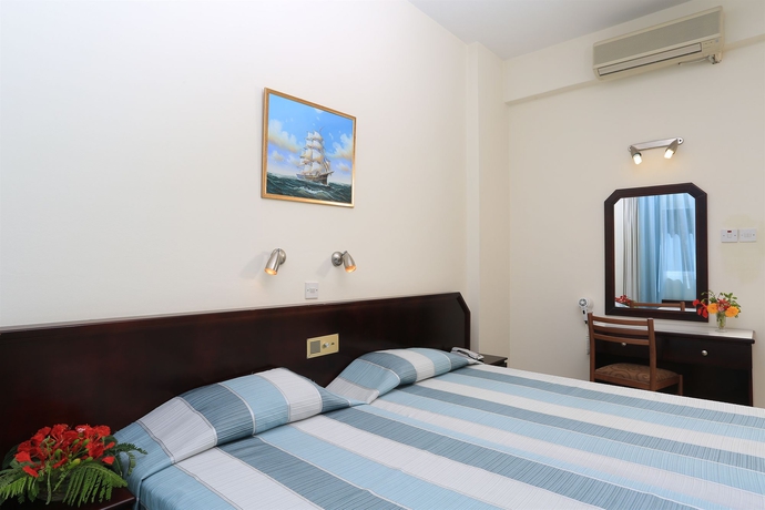 Imagen de la habitación del Hotel Jacaranda Apartments. Foto 5