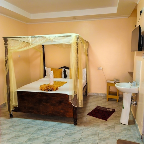 Imagen de la habitación del Hotel Jacaranda Luxury Suites. Foto 9