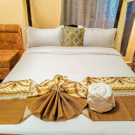 Imagen de la habitación del Hotel Jacaranda Luxury Suites. Foto 12