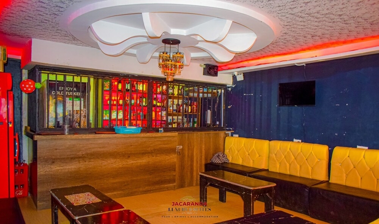 Imagen del bar/restaurante del Hotel Jacaranda Luxury Suites. Foto 3