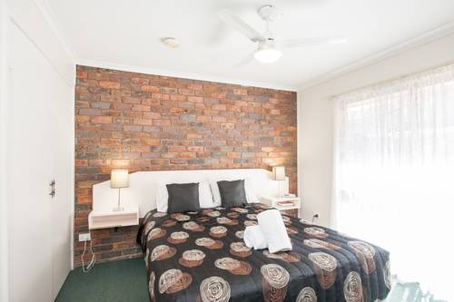 Imagen de la habitación del Hotel Jacaranda Place Motor Inn. Foto 2