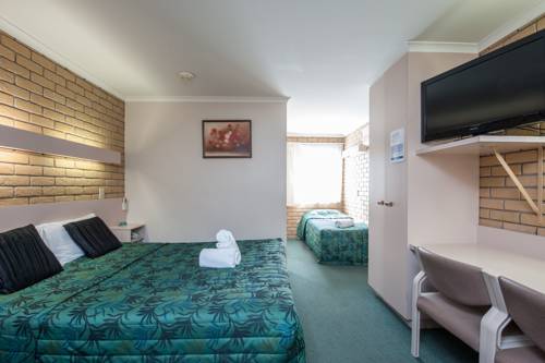 Imagen de la habitación del Hotel Jacaranda Place Motor Inn. Foto 4