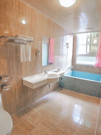 Imagen de la habitación del Hotel Jade Spring Hot Spring. Foto 11