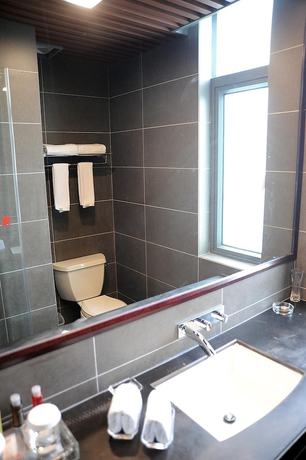 Imagen de la habitación del Hotel Jade Time Villa Hotel Tengchong. Foto 7