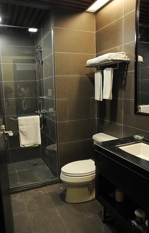 Imagen de la habitación del Hotel Jade Time Villa Hotel Tengchong. Foto 8