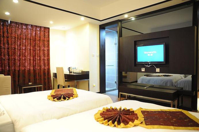 Imagen de la habitación del Hotel Jade Time Villa Hotel Tengchong. Foto 10