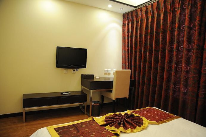 Imagen de la habitación del Hotel Jade Time Villa Hotel Tengchong. Foto 19