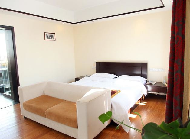 Imagen de la habitación del Hotel Jade Time Villa Hotel Tengchong. Foto 20