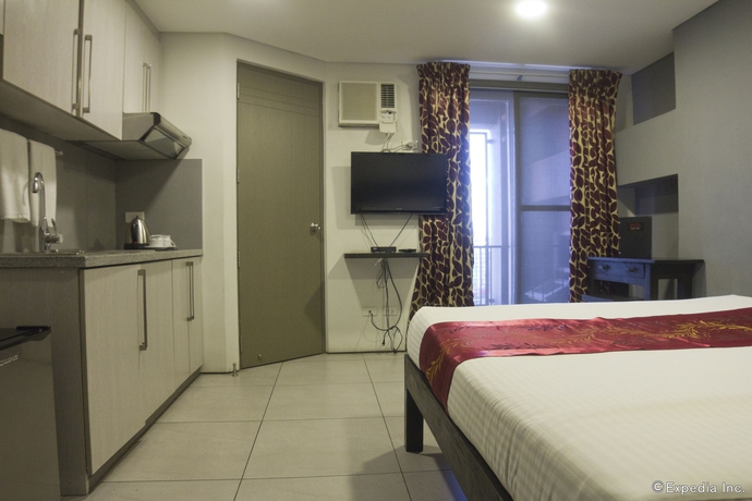 Imagen de la habitación del Hotel Jade and Suites. Foto 2