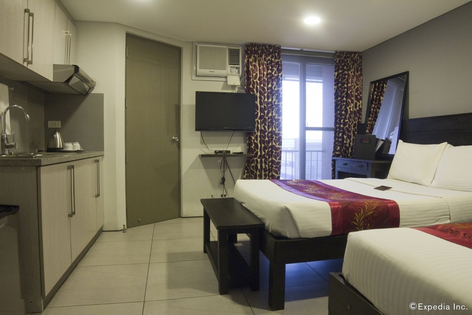 Imagen de la habitación del Hotel Jade and Suites. Foto 7