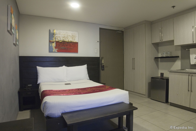 Imagen de la habitación del Hotel Jade and Suites. Foto 10