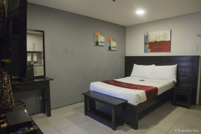 Imagen de la habitación del Hotel Jade and Suites. Foto 11