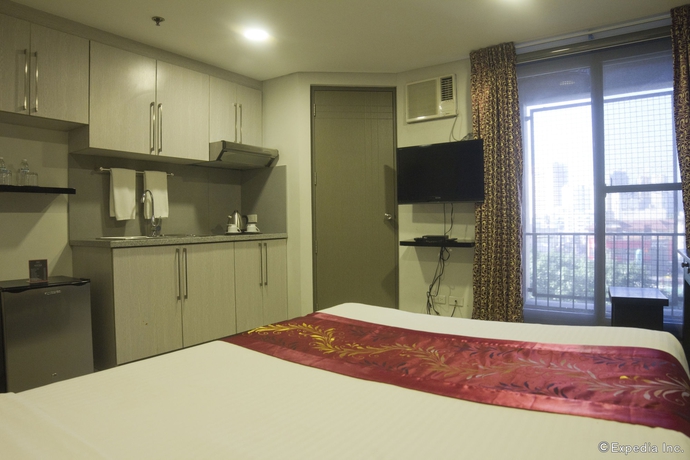 Imagen de la habitación del Hotel Jade and Suites. Foto 12