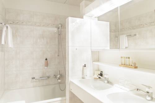 Imagen de la habitación del Hotel Jagd-schloss - Swiss-chalet Merlischachen. Foto 9