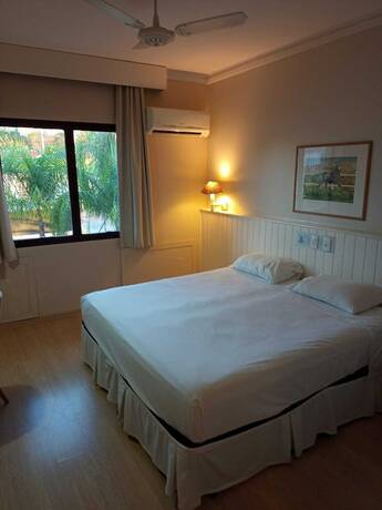 Imagen de la habitación del Hotel Jaguary e Residence. Foto 13