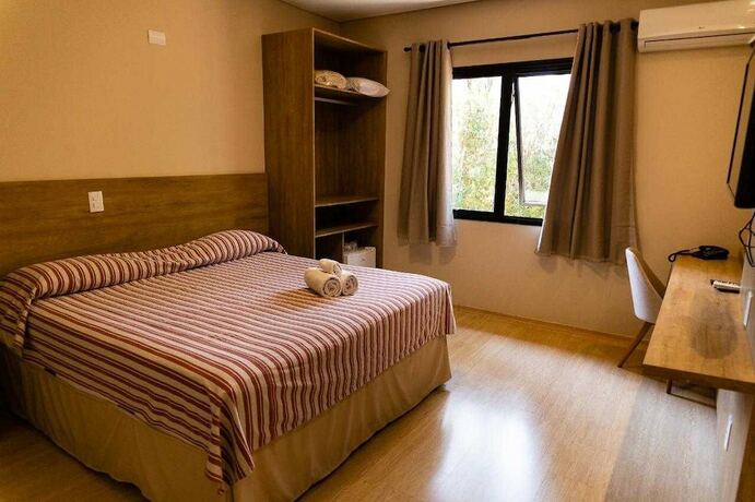 Imagen de la habitación del Hotel Jaguary e Residence. Foto 14