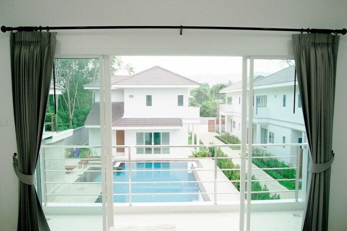 Imagen de la habitación del Hotel Jai House Phuket. Foto 27