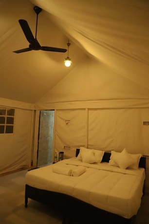 Imagen de la habitación del Hotel Jain Empire Resort and Camp. Foto 13