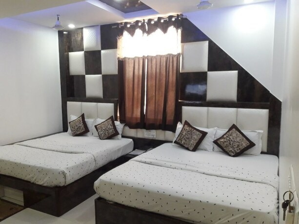 Imagen de la habitación del Hotel Jainson Residency. Foto 6