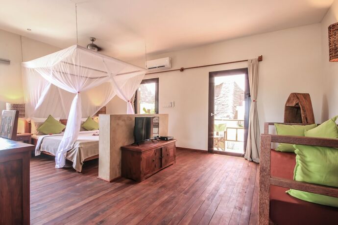 Imagen de la habitación del Hotel Jambiani Villas. Foto 16