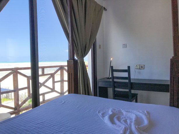 Imagen de la habitación del Hotel Jambiani White Sands Beach Bungalows. Foto 6