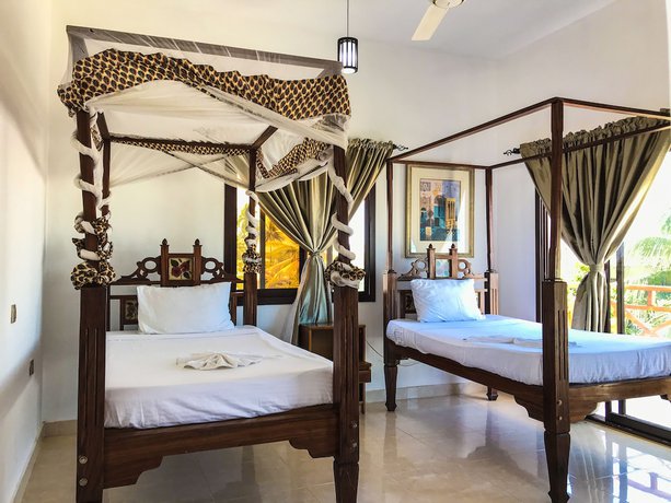 Imagen de la habitación del Hotel Jambiani White Sands Beach Bungalows. Foto 7