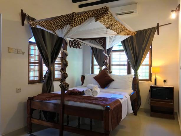 Imagen de la habitación del Hotel Jambiani White Sands Beach Bungalows. Foto 15