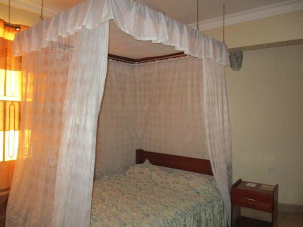 Imagen de la habitación del Hotel Jambo Village. Foto 9