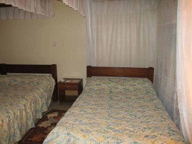 Imagen de la habitación del Hotel Jambo Village. Foto 13