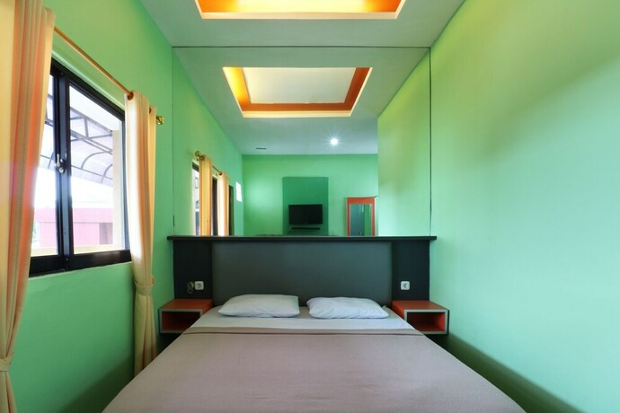 Imagen de la habitación del Hotel Jambrut Inn. Foto 17