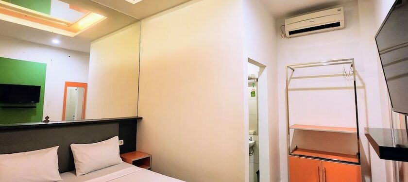 Imagen de la habitación del Hotel Jambrut Inn. Foto 19