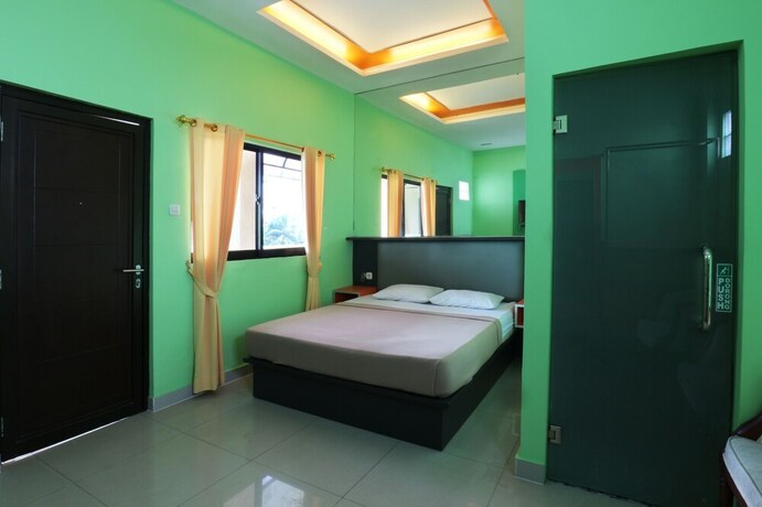 Imagen de la habitación del Hotel Jambrut Inn. Foto 25