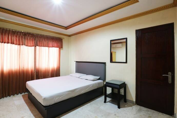 Imagen de la habitación del Hotel Jambrut Inn. Foto 29