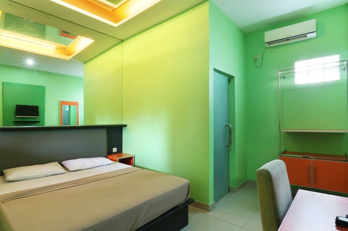 Imagen de la habitación del Hotel Jambrut Inn. Foto 30