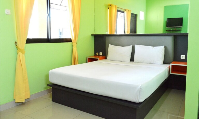 Imagen de la habitación del Hotel Jambrut Inn. Foto 34