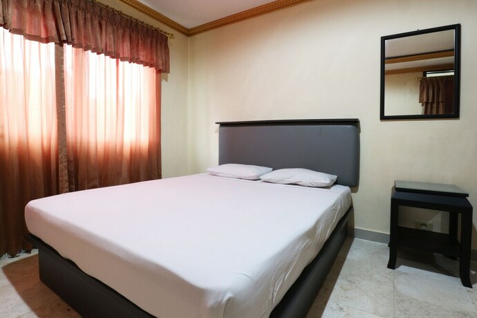 Imagen de la habitación del Hotel Jambrut Inn. Foto 35