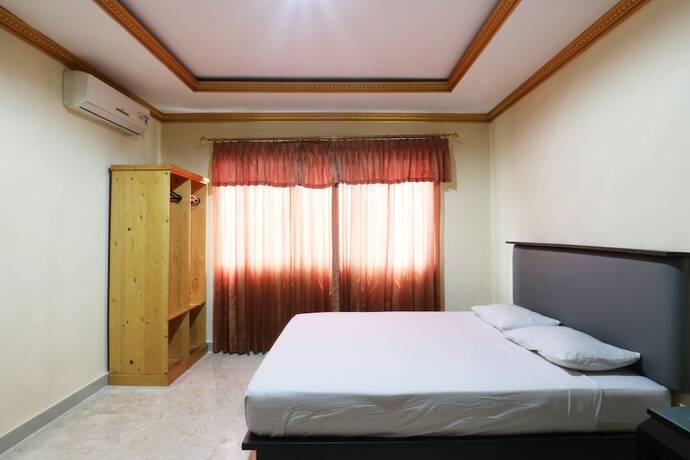 Imagen de la habitación del Hotel Jambrut Inn. Foto 36