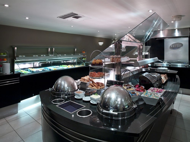 Imagen del bar/restaurante del Hotel James Cook Grand Chancellor. Foto 6