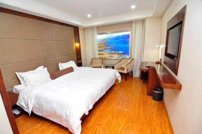 Imagen de la habitación del Hotel James Joyce Coffetel Dongxiaonan. Foto 4
