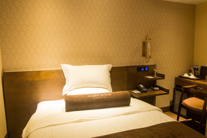 Imagen de la habitación del Hotel James Joyce Coffetel - Guangzhou Exhibition Center. Foto 9