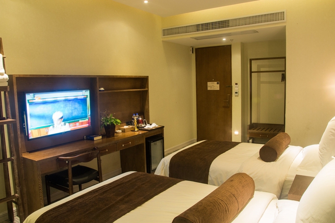 Imagen de la habitación del Hotel James Joyce Coffetel - Guangzhou Exhibition Center. Foto 10