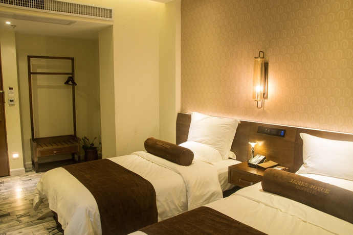 Imagen de la habitación del Hotel James Joyce Coffetel - Guangzhou Exhibition Center. Foto 11