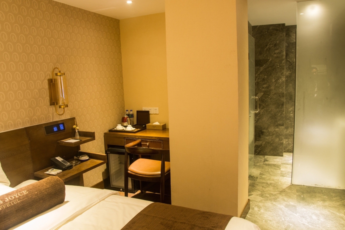 Imagen de la habitación del Hotel James Joyce Coffetel - Guangzhou Exhibition Center. Foto 13