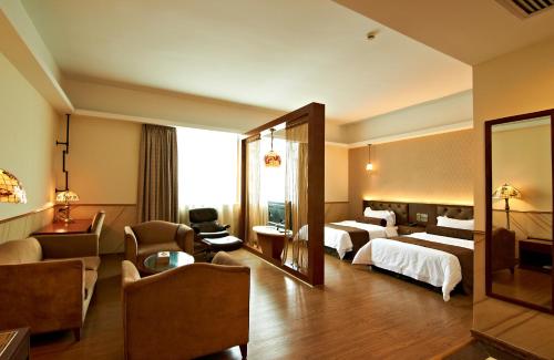 Imagen de la habitación del Hotel James Joyce Coffetel Guangzhou Shi Jing City. Foto 6