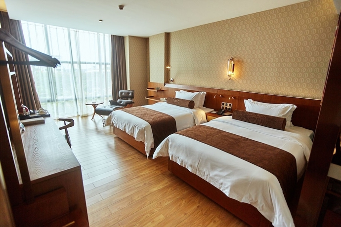 Imagen de la habitación del Hotel James Joyce Coffetel Qifu Xincun Branch. Foto 5