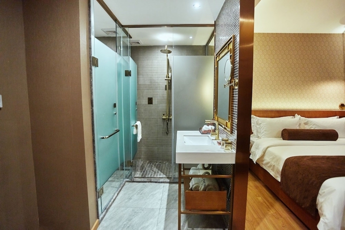 Imagen de la habitación del Hotel James Joyce Coffetel Qifu Xincun Branch. Foto 8